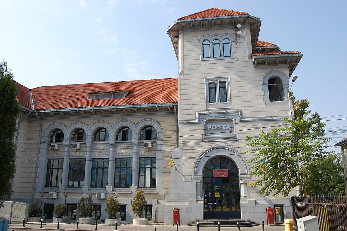 Clădirea Oficiului Poștal nr. 1 din Craiova, cu inscripția „POSTA” pe fațadă și intrarea cu arc în centru.