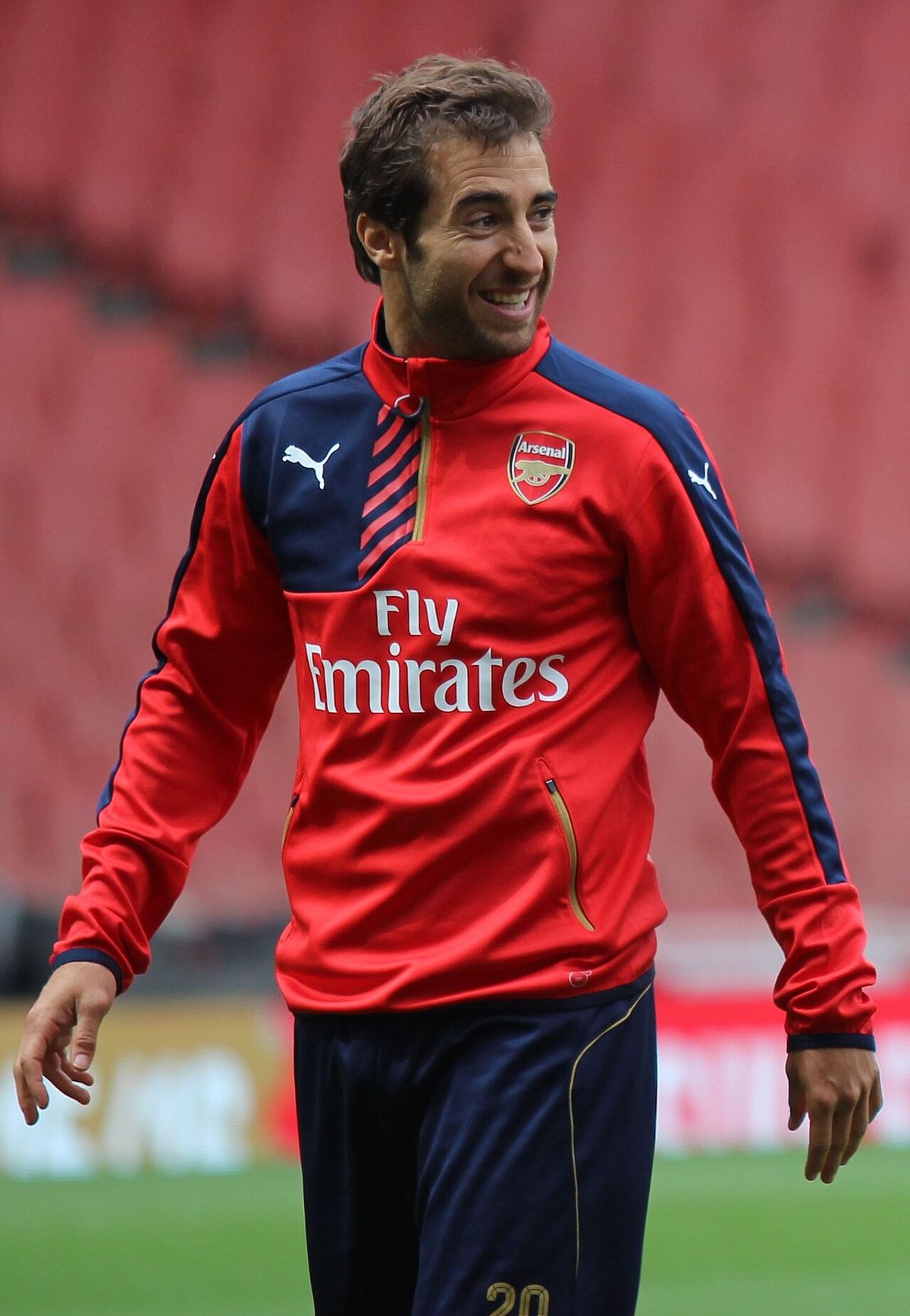 Mathieu Flamini în echipamentul de antrenament al Arsenal, zâmbind (fotografie de arhivă din 2015).